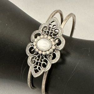 Silver clamper bracelet with simulated moonstone